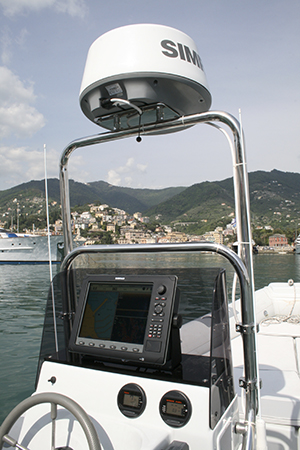 Simrad broadband 4g radome mounted at the helm of a boat