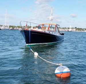 Powerboat moored through bow chocks