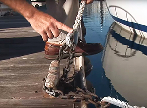Dockline combined with chain secured to dock cleat.