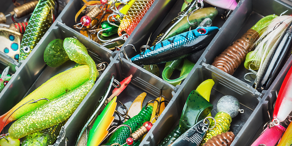 Inside of tackle box with various lures