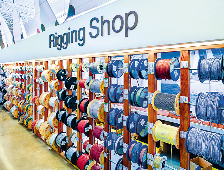 Assortment of rope spools mounted on wall in West Marine rigging shop