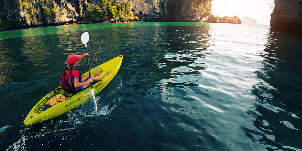 Female paddling kayak