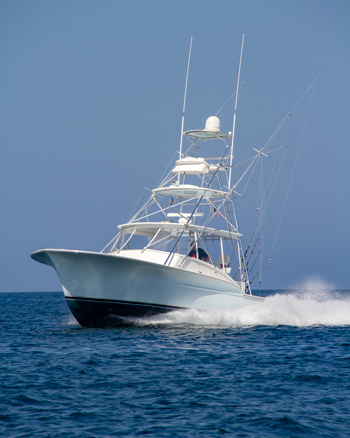 Large power boat with outriggers