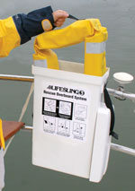 Lifesling being removed from case attached to the stern pulpit of a boat