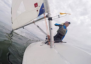 sailor gybing a small dinghy