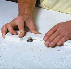 Machining marine lumber with a carbide router bit