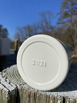 Bottom of extinguisher bottle showing date stamp